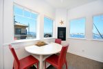 Enjoy your morning coffee in front of the fireplace looking out on the boats going by.